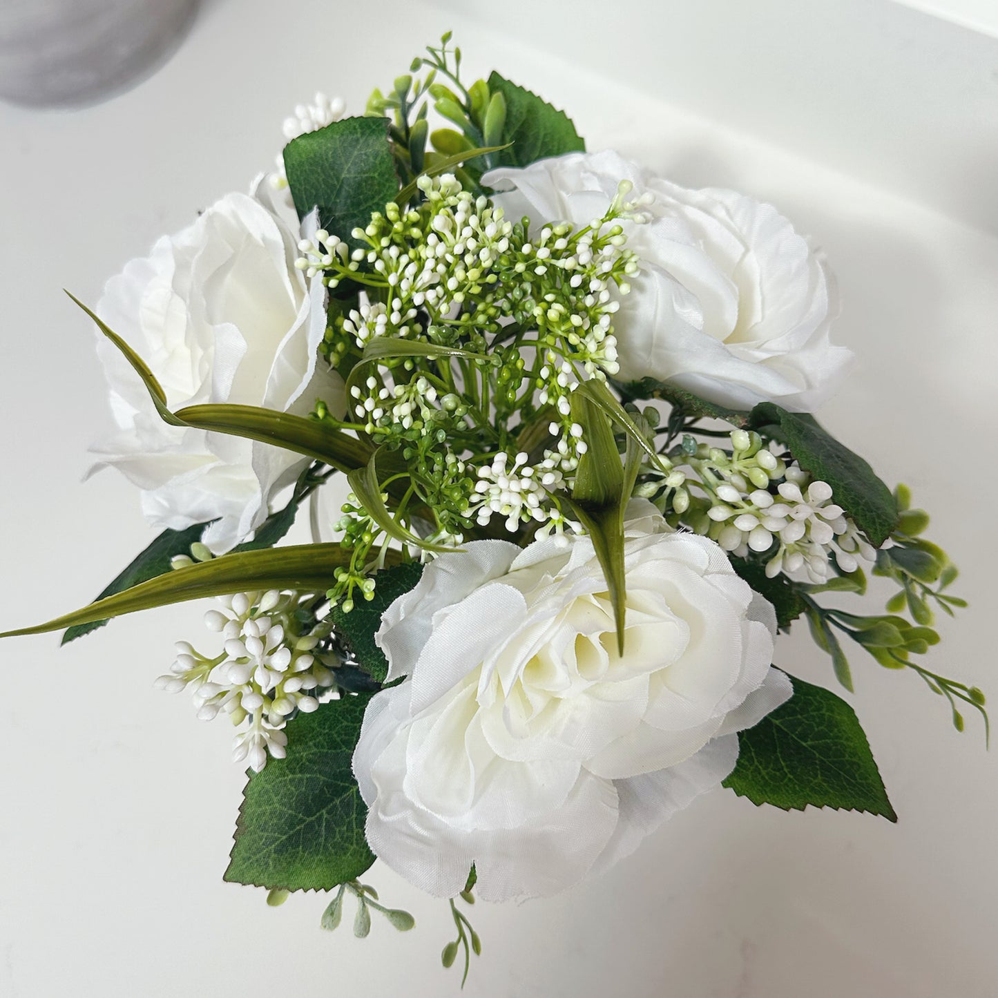 Clear Vase Filled With Roses