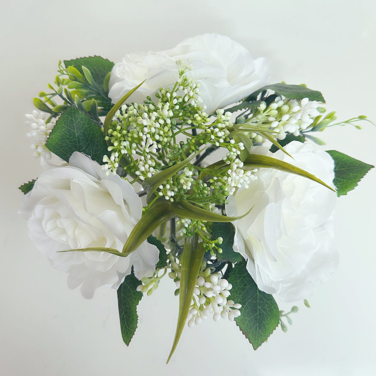 Clear Vase Filled With Roses