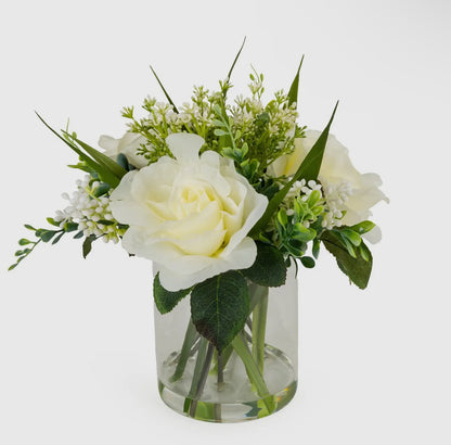 Clear Vase Filled With Roses