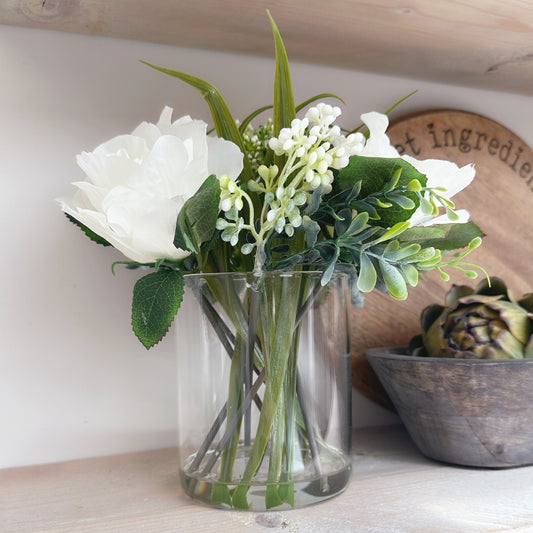 Clear Vase Filled With Roses
