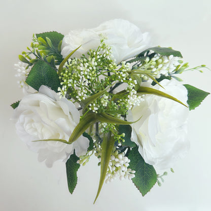 Clear Vase Filled With Roses